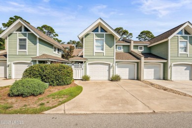 Unwind on your screened porch with front-row views of Davis on Ocean Creek Golf Course in South Carolina - for sale on GolfHomes.com, golf home, golf lot