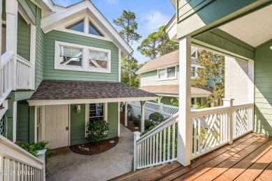 Unwind on your screened porch with front-row views of Davis on Ocean Creek Golf Course in South Carolina - for sale on GolfHomes.com, golf home, golf lot