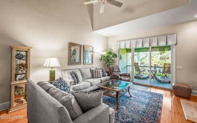 Unwind on your screened porch with front-row views of Davis on Ocean Creek Golf Course in South Carolina - for sale on GolfHomes.com, golf home, golf lot