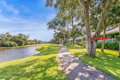 Unwind on your screened porch with front-row views of Davis on Ocean Creek Golf Course in South Carolina - for sale on GolfHomes.com, golf home, golf lot