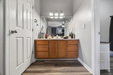 Welcome to your slice of paradise! This charming main level on The Eagle Pointe Golf Resort in Indiana - for sale on GolfHomes.com, golf home, golf lot