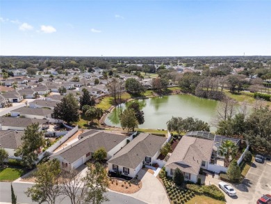 This CUSTOM Amelia courtyard villa, offering 2 Bedrooms and a on The Links of Spruce Creek in Florida - for sale on GolfHomes.com, golf home, golf lot