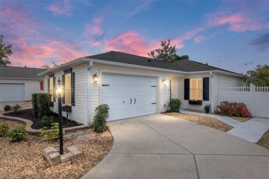 This CUSTOM Amelia courtyard villa, offering 2 Bedrooms and a on The Links of Spruce Creek in Florida - for sale on GolfHomes.com, golf home, golf lot