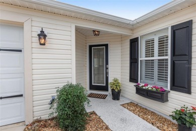 This CUSTOM Amelia courtyard villa, offering 2 Bedrooms and a on The Links of Spruce Creek in Florida - for sale on GolfHomes.com, golf home, golf lot