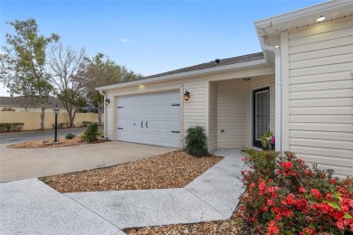 This CUSTOM Amelia courtyard villa, offering 2 Bedrooms and a on The Links of Spruce Creek in Florida - for sale on GolfHomes.com, golf home, golf lot