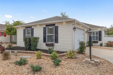 This CUSTOM Amelia courtyard villa, offering 2 Bedrooms and a on The Links of Spruce Creek in Florida - for sale on GolfHomes.com, golf home, golf lot