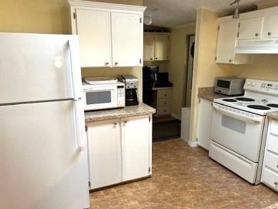 55 Plus Community, Discover this delightful 2-bedroom on Crystal Lake Club in Florida - for sale on GolfHomes.com, golf home, golf lot