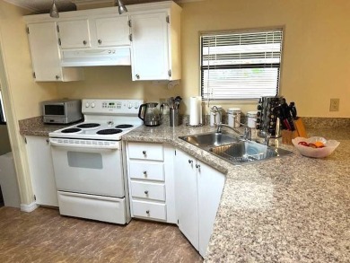 55 Plus Community, Discover this delightful 2-bedroom on Crystal Lake Club in Florida - for sale on GolfHomes.com, golf home, golf lot