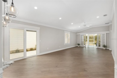 This CUSTOM Amelia courtyard villa, offering 2 Bedrooms and a on The Links of Spruce Creek in Florida - for sale on GolfHomes.com, golf home, golf lot