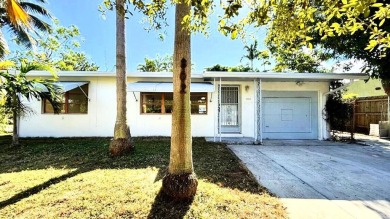 LOCATION! Desirable ''SoSo'' District, corner lot, Intracoastal on West Palm Beach Golf Course in Florida - for sale on GolfHomes.com, golf home, golf lot