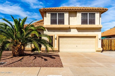 Located on a corner lot just a short walk from the lake in on Estrella Mountain Ranch Golf Course in Arizona - for sale on GolfHomes.com, golf home, golf lot