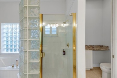 Stunning Golf Course Home with Resort-Style Living in The on Country Club of Mount Dora in Florida - for sale on GolfHomes.com, golf home, golf lot
