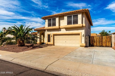 Located on a corner lot just a short walk from the lake in on Estrella Mountain Ranch Golf Course in Arizona - for sale on GolfHomes.com, golf home, golf lot