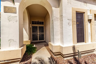 Located on a corner lot just a short walk from the lake in on Estrella Mountain Ranch Golf Course in Arizona - for sale on GolfHomes.com, golf home, golf lot