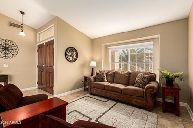 Located on a corner lot just a short walk from the lake in on Estrella Mountain Ranch Golf Course in Arizona - for sale on GolfHomes.com, golf home, golf lot