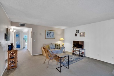 Nicely maintained 1st floor *A* plan, 2/2 condo. Being offered on The American Golf Club in Florida - for sale on GolfHomes.com, golf home, golf lot