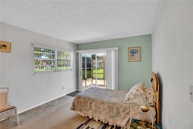 Nicely maintained 1st floor *A* plan, 2/2 condo. Being offered on The American Golf Club in Florida - for sale on GolfHomes.com, golf home, golf lot