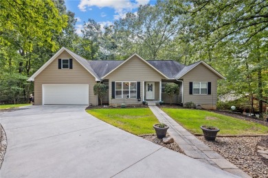 Welcome to your new home nestled in the trees with seasonal on The Trail At Chickasaw Pointe in South Carolina - for sale on GolfHomes.com, golf home, golf lot