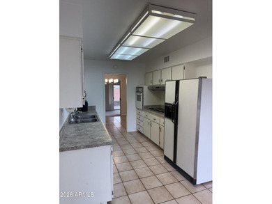 Charming & well-appointed! A single-story is located near the on Sun City Country Club in Arizona - for sale on GolfHomes.com, golf home, golf lot