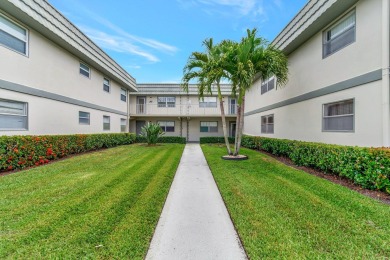 First floor contemporary condominium in gated Kings Point on Kings Point Golf -Flanders Way in Florida - for sale on GolfHomes.com, golf home, golf lot