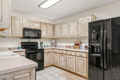 RARE OPPORTUNITY - BRICK HOME WITH ATTACHED APARTMENT ON THE on Deer Creek Golf Club in Tennessee - for sale on GolfHomes.com, golf home, golf lot