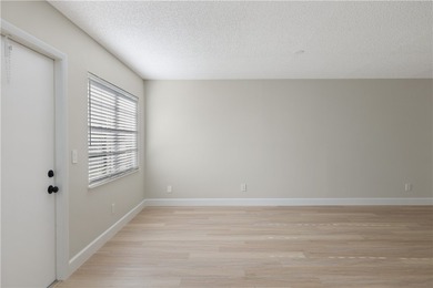 Bright, spacious first floor condo in Vista Gardens, a beautiful on Vero Beach South Golf Course in Florida - for sale on GolfHomes.com, golf home, golf lot