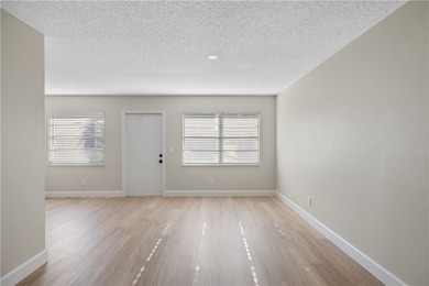 Bright, spacious first floor condo in Vista Gardens, a beautiful on Vero Beach South Golf Course in Florida - for sale on GolfHomes.com, golf home, golf lot