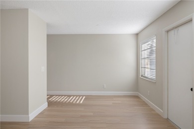 Bright, spacious first floor condo in Vista Gardens, a beautiful on Vero Beach South Golf Course in Florida - for sale on GolfHomes.com, golf home, golf lot