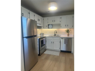 Bright, spacious first floor condo in Vista Gardens, a beautiful on Vero Beach South Golf Course in Florida - for sale on GolfHomes.com, golf home, golf lot