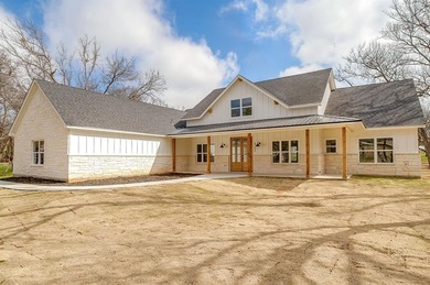 Welcome to 6705 Westover, a beautifully designed custom on Pecan Plantation Country Club in Texas - for sale on GolfHomes.com, golf home, golf lot