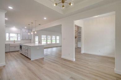 Welcome to 6705 Westover, a beautifully designed custom on Pecan Plantation Country Club in Texas - for sale on GolfHomes.com, golf home, golf lot