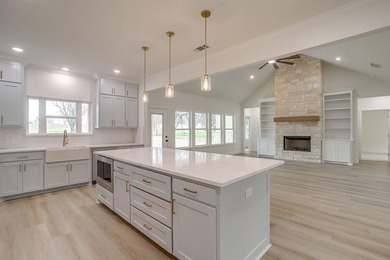 Welcome to 6705 Westover, a beautifully designed custom on Pecan Plantation Country Club in Texas - for sale on GolfHomes.com, golf home, golf lot