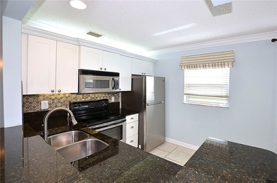 RARE FIND...1st Floor remodeled 2 Bed/2 Bath partially furnished on The American Golf Club in Florida - for sale on GolfHomes.com, golf home, golf lot