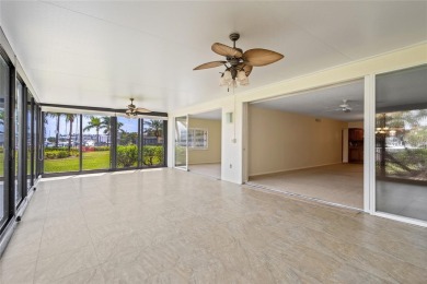 Enjoy waterfront living at its finest in this spacious on Burnt Store Golf Club in Florida - for sale on GolfHomes.com, golf home, golf lot