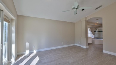 This lovely 3BR 2 BA home is located in the highly desirable on Plantation Bay Golf and Country Club in Florida - for sale on GolfHomes.com, golf home, golf lot