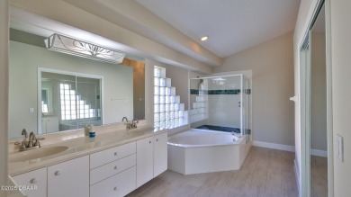 This lovely 3BR 2 BA home is located in the highly desirable on Plantation Bay Golf and Country Club in Florida - for sale on GolfHomes.com, golf home, golf lot
