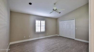 This lovely 3BR 2 BA home is located in the highly desirable on Plantation Bay Golf and Country Club in Florida - for sale on GolfHomes.com, golf home, golf lot