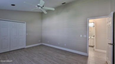 This lovely 3BR 2 BA home is located in the highly desirable on Plantation Bay Golf and Country Club in Florida - for sale on GolfHomes.com, golf home, golf lot