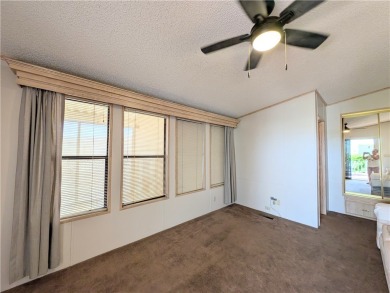 Lovely, oversized corner lot with a fabulous, covered patio and on Riverview Golf Course in Arizona - for sale on GolfHomes.com, golf home, golf lot