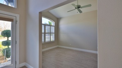 This lovely 3BR 2 BA home is located in the highly desirable on Plantation Bay Golf and Country Club in Florida - for sale on GolfHomes.com, golf home, golf lot