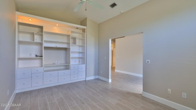 This lovely 3BR 2 BA home is located in the highly desirable on Plantation Bay Golf and Country Club in Florida - for sale on GolfHomes.com, golf home, golf lot