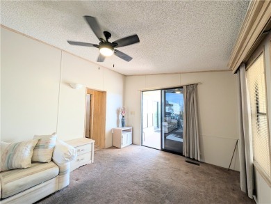Lovely, oversized corner lot with a fabulous, covered patio and on Riverview Golf Course in Arizona - for sale on GolfHomes.com, golf home, golf lot