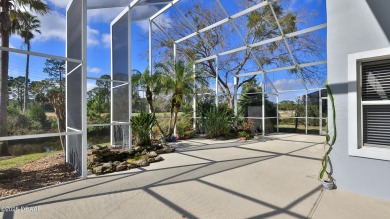 This lovely 3BR 2 BA home is located in the highly desirable on Plantation Bay Golf and Country Club in Florida - for sale on GolfHomes.com, golf home, golf lot