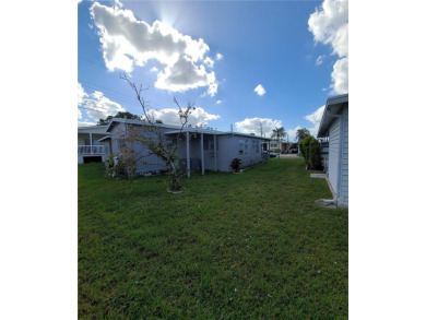 Welcome home!!  This adorably 2 bed, 1.5 bath home is the on Heather Hills Golf Course in Florida - for sale on GolfHomes.com, golf home, golf lot