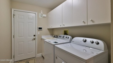 This lovely 3BR 2 BA home is located in the highly desirable on Plantation Bay Golf and Country Club in Florida - for sale on GolfHomes.com, golf home, golf lot