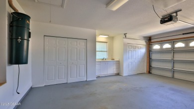 This lovely 3BR 2 BA home is located in the highly desirable on Plantation Bay Golf and Country Club in Florida - for sale on GolfHomes.com, golf home, golf lot