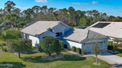 This lovely 3BR 2 BA home is located in the highly desirable on Plantation Bay Golf and Country Club in Florida - for sale on GolfHomes.com, golf home, golf lot