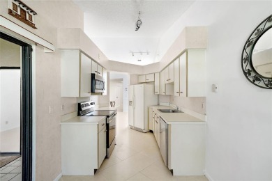Spacious 3 bedrooms 2 baths condo in the gated Fairways at Boca on Bocaire Country Club in Florida - for sale on GolfHomes.com, golf home, golf lot
