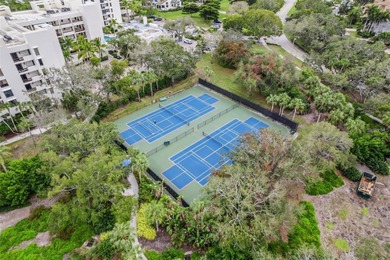 Carefree living awaits you with beautiful panoramic views of on Longboat Key Golf Club Resort in Florida - for sale on GolfHomes.com, golf home, golf lot