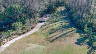 This lovely 3BR 2 BA home is located in the highly desirable on Plantation Bay Golf and Country Club in Florida - for sale on GolfHomes.com, golf home, golf lot